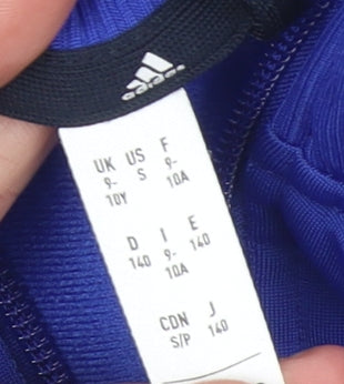 Brand and care label for Adidas boys’ blue track jacket 10 years full zip colourblock activewear