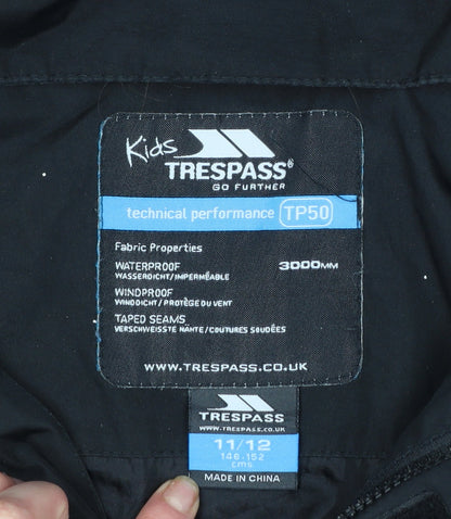 Brand and care label for Trespass boys’ black waterproof hooded parka jacket 11-12 years