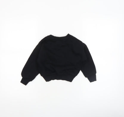 Close-up detail of Disney girls’ black stitch & angel ohana pullover sweatshirt 4-5 years