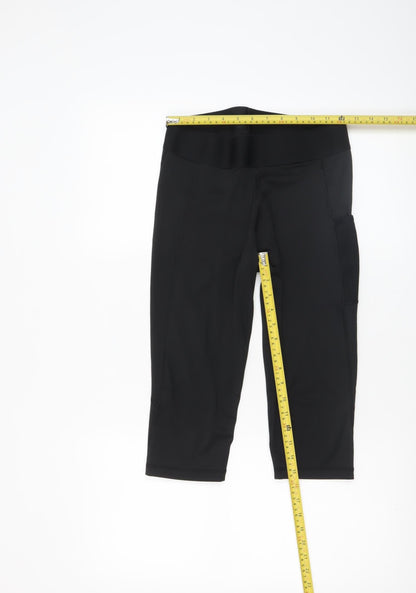 Back view of Adidas women’s black aeroready compression shorts, size M