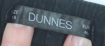 Brand and care label for Dunnes women’s black cargo trousers, size UK 18, regular cotton straight leg