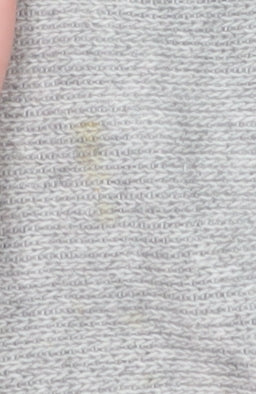 Brand and care label for Dunnes men’s grey medium v-neck cotton blend jumper
