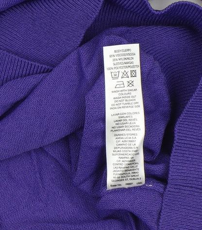 Brand and care label for Gallery women’s purple polka dot sleeve jumper m