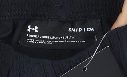 Brand and care label for Under Armour boys’ black small loose fit athletic shorts polyester