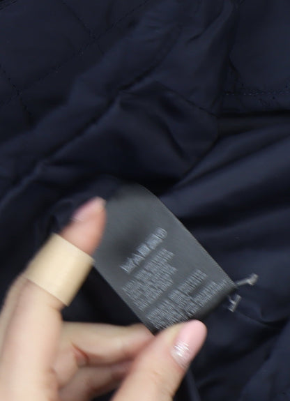 Brand and care label for BDG Men’s Blue Quilted Mid-Length Jacket XS Polyester