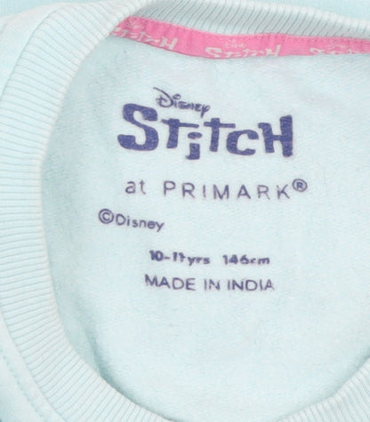 Brand and care label for Disney Stitch girls’ blue christmas pullover sweatshirt 10-11 years primark