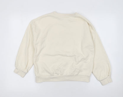 Close-up detail of Marks & Spencer girls’ beige gryffindor pullover sweatshirt 10-11 years