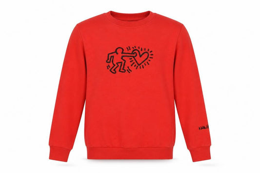 Front view of H&M girls’ red keith haring graphic cotton sweatshirt 14-15 years