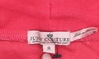 Brand and care label for Juicy Couture girls’ red velour sweatpants age 8 years elastic waist