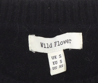Brand and care label for Wild Flower women’s black sequin sleeve jumper, size S