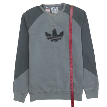 Close-up detail of adidas boys’ grey crew neck pullover sweatshirt, size 16, years