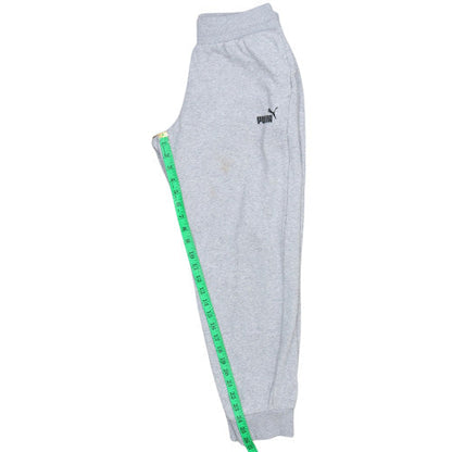 Close-up detail of Puma women’s grey sweatpants jogger trousers, size M