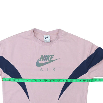 Close-up detail of Nike girls’ pink crew neck sweatshirt xl graphic print pullover