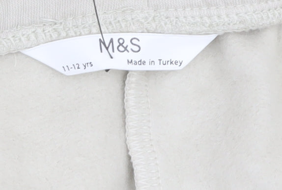Marks and Spencer Boys Beige Jogger Trousers 11-12 Years Cartoon Print