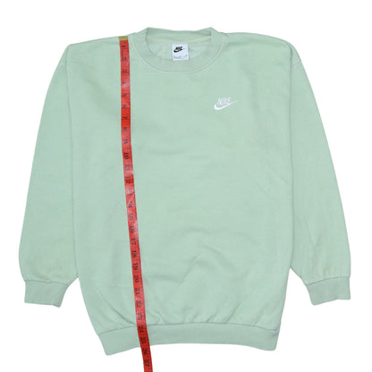 Close-up detail of Nike boys’ green xl pullover sweatshirt crew neck fleece logo top