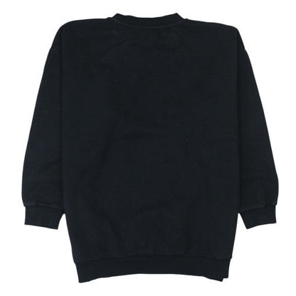 Brand and care label for Nike girls’ black gold logo xl sweatshirt crew neck pullover