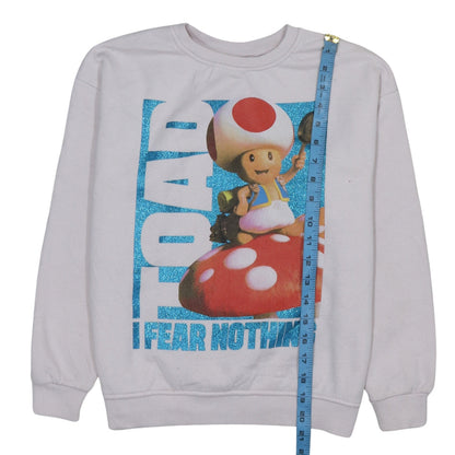 Close-up detail of Primark girls’ white toad super mario bros sweatshirt 11 years pullover