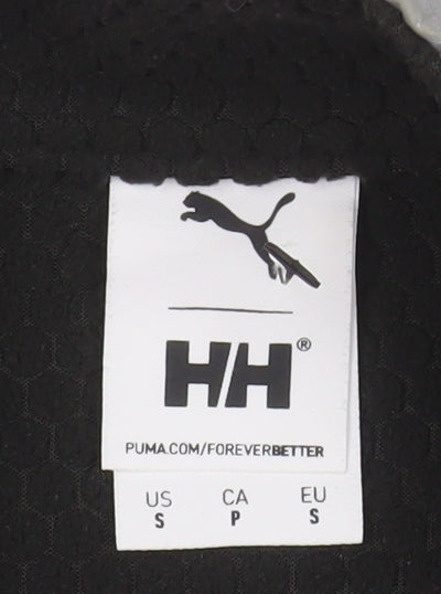 Brand and care label for Puma Women’s Black Reflective Activewear Vest Jacket, size S