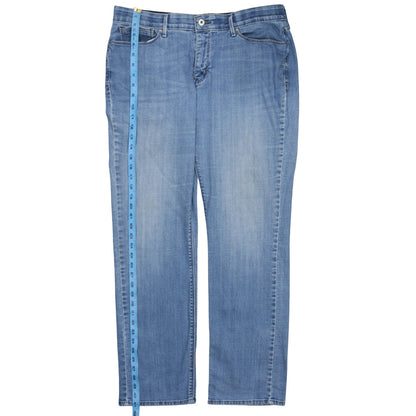 Close-up detail of Levi's women’s blue 525 straight leg jeans, size UK 16, regular denim