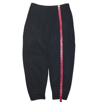 Close-up detail of Adidas women’s black m jogger sweatpants cotton blend