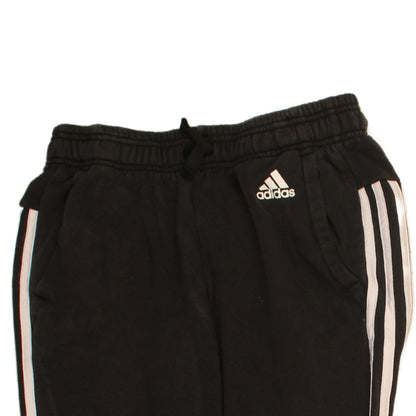 Brand and care label for Adidas women’s black small jogger sweatpants with white stripes