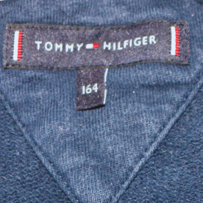 Close-up detail of Tommy Hilfiger boys’ blue 164 pullover sweatshirt embroidered logo