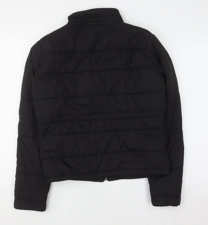 Close-up detail of Fila men’s black puffer jacket m lightweight quilted zip coat