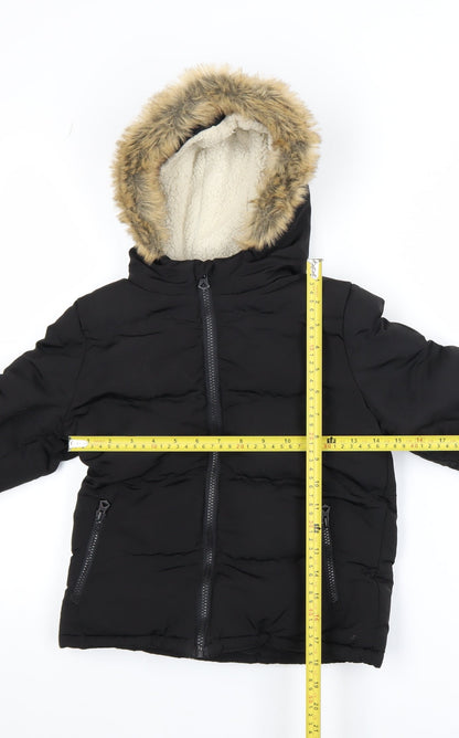 Back view of SoulCal boys’ black faux fur hooded puffer jacket 6-7 years winter coat