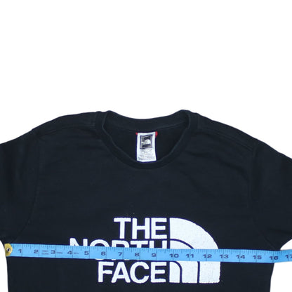 Close-up detail of The North Face boys’ black m crew neck pullover sweatshirt cotton logo