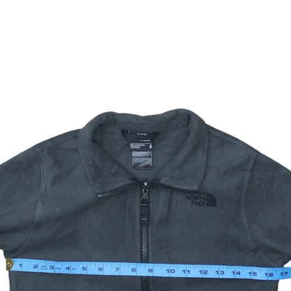 Back view of The North Face boys’ black fleece full zip jacket, size M