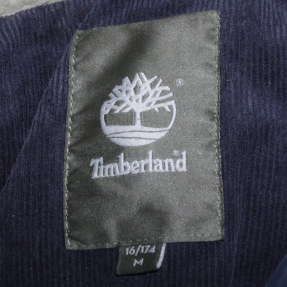 Close-up detail of Timberland boys’ blue 16 years winter puffer jacket with faux fur lining