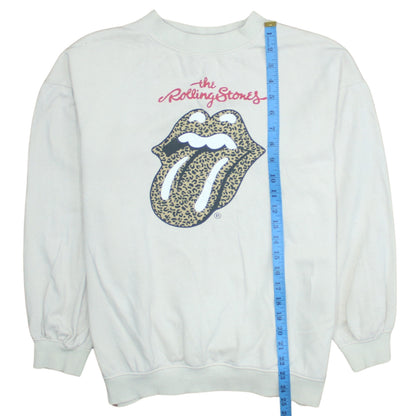 Close-up detail of H&M girls’ white rolling stones leopard print pullover sweatshirt 10-12 years