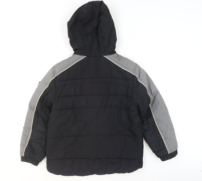 Close-up detail of Protection System boys’ black puffer jacket 8 years hooded full zip winter coat