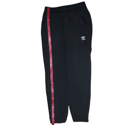 Back view of Adidas men’s black jogger sweatpants, size S, regular fit