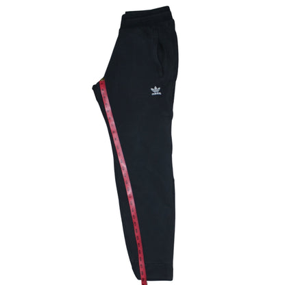 Close-up detail of Adidas men’s black jogger sweatpants, size S, regular fit