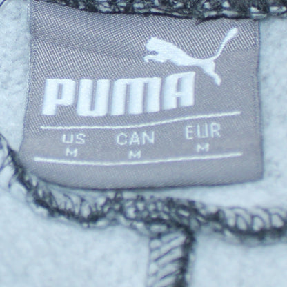 Brand and care label for Puma Men's Black Jogger Sweatpants M Regular Fit