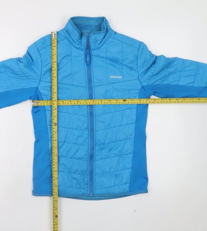 Back view of Quechua boys’ blue 10-11 years lightweight puffer jacket full zip