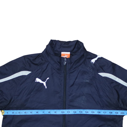 Close-up detail of Puma boys’ blue full zip lightweight track jacket, size 14, years