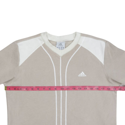 Close-up detail of Adidas boys’ beige v-neck pullover sweatshirt, size 176, long sleeve