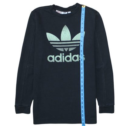 Close-up detail of Adidas boys’ black crew neck pullover sweatshirt, size 13-14, years