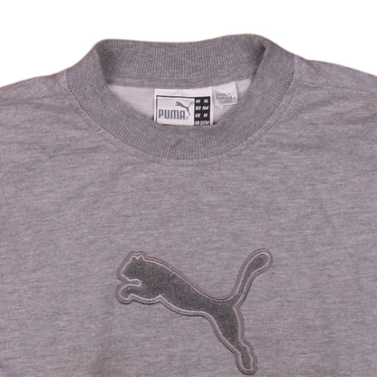 Brand and care label for Puma boys’ grey crew neck pullover sweatshirt, size 164, logo embroidered top