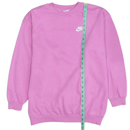 Close-up detail of Nike girls’ pink xl pullover crew neck fleece sweatshirt