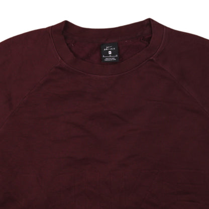 Brand and care label for Nike Women’s Burgundy Dri-Fit Sweatshirt XL Crew Neck Pullover