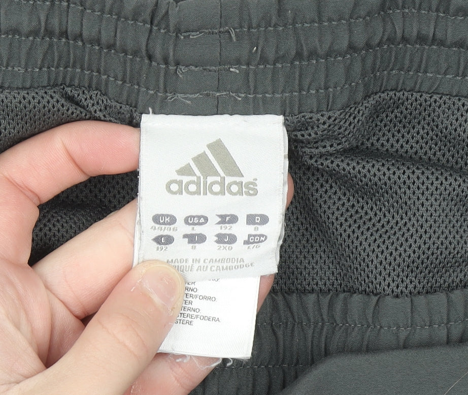 Adidas Men's Black 2XL Track Pants with Blue Side Stripes