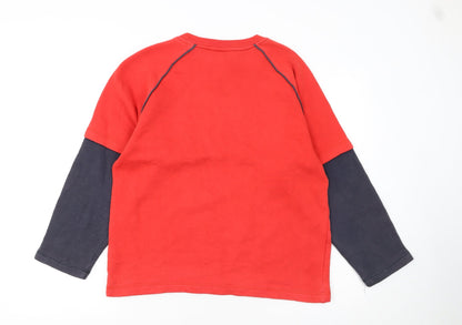 Close-up detail of Adidas boys’ red pullover sweatshirt 14 years logo athletic fleece top