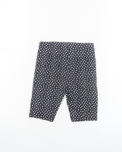 Close-up detail of St. Bernard for Dunnes girls’ black polka dot biker shorts age 5
