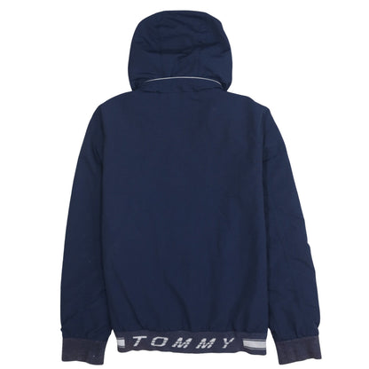 Brand and care label for Tommy Hilfiger boys’ blue hooded windbreaker jacket, size 14, years