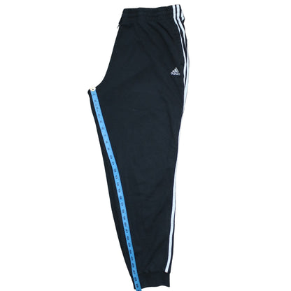 Brand and care label for Adidas Women's Black XL Track Pants with Side Stripes