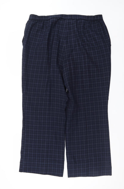 Close-up detail of Marks & Spencer Men's Blue Check Pleated Trousers, size 18