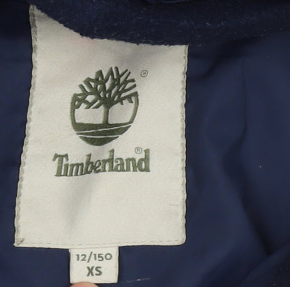 Brand and care label for Timberland boys’ blue hooded puffer jacket, size 12, years